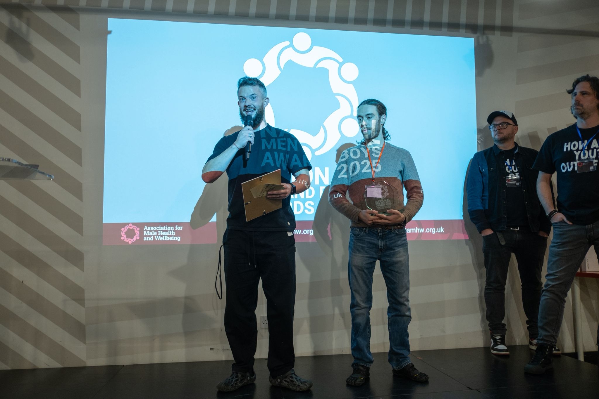 Mandem Meetup accepting the Project of the Year award
